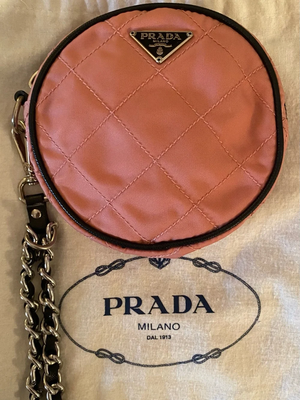 PRADA MINI CIRCLE QUILTED BAG/WRISTLET